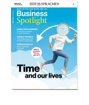 Cover der Zeitschrift "Business Spotlight" mit dem Titel "Time and our lives". Ein junger Mann mit einer Uhr als Kopf läuft vor einem blauen Hintergrund. Themen: Zeitmanagement und Lebensbalance im geschäftlichen Kontext.